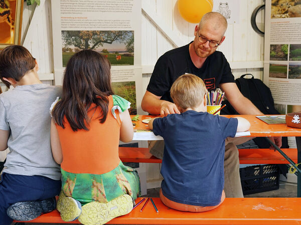 Stand auf dem Tollwood Sommerfestival am 14.07.2025. 
